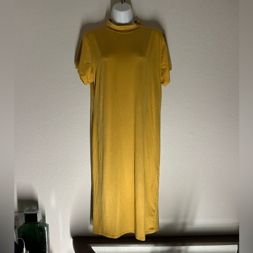 2X Absolutely ❤️It simply simple long dress.  Nice color no flaws easy fit
